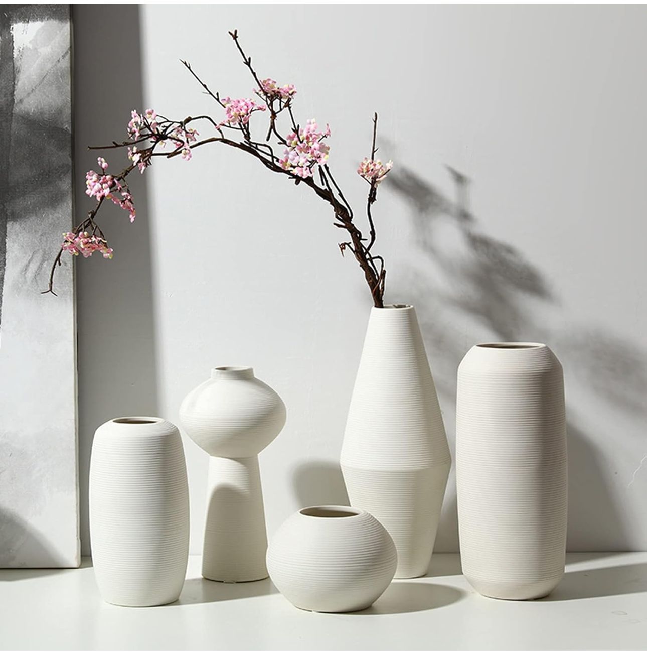 Jarron florero de ceramica blanco en espiral mediano 10cm* 10cm* 20cm